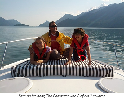 Sam with 2 of his 3 children on his boat, The Goalsetter